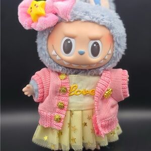 Adorable Pink and Yellow Doll with Star Accessories